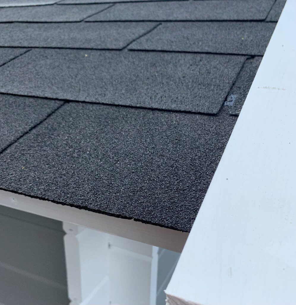 American Barn Style Asphalt Tiles on a Kitset log cabin