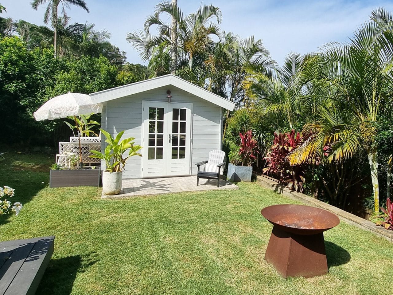 Firepit with outdoor timber shed
