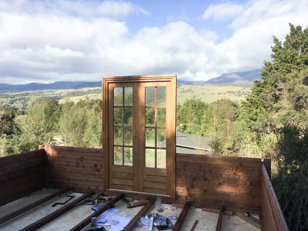 Log Cabin getting built in NZ with a stunning farmland view