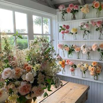 Florist running a business from home using a wooden studio