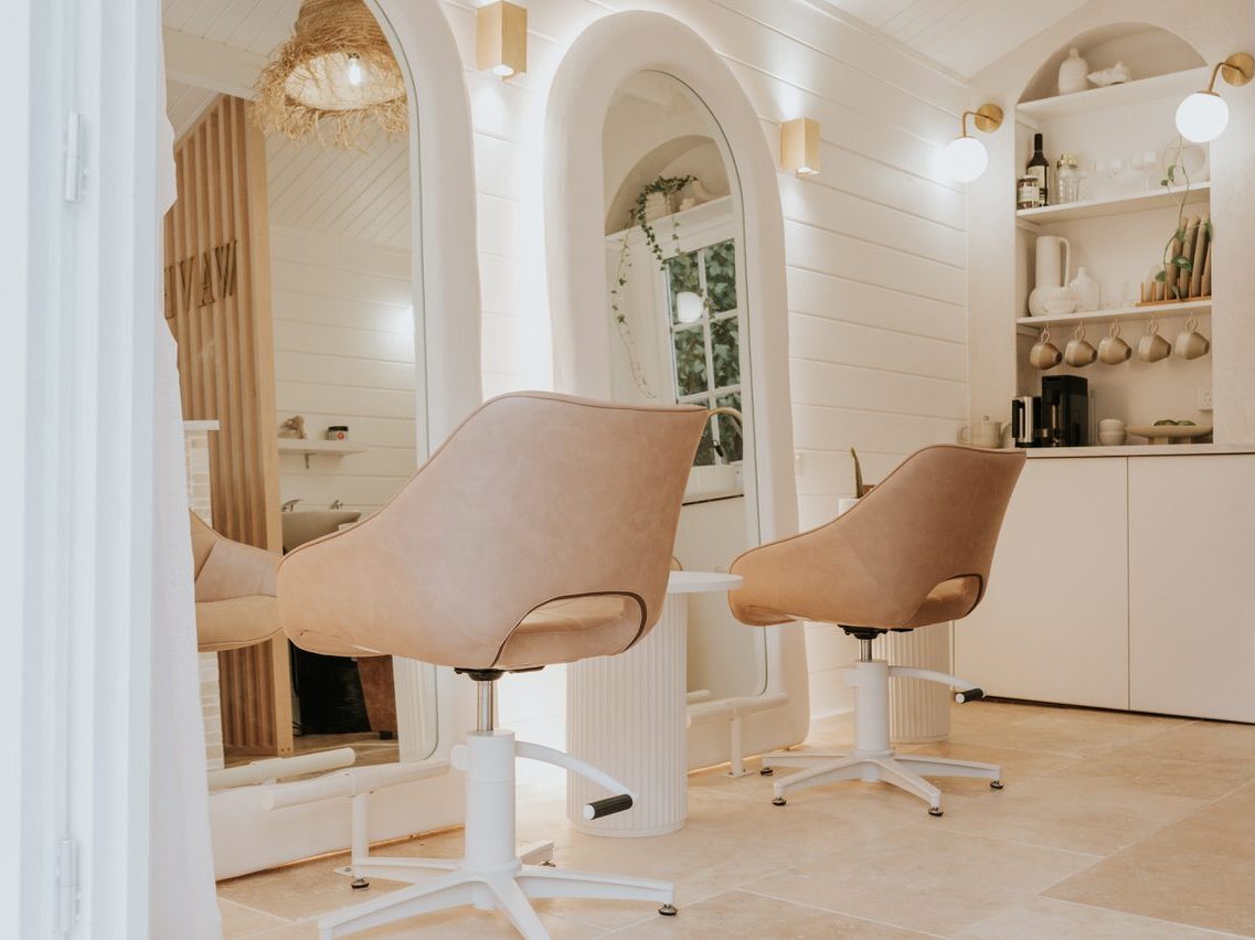 She shed cabin as home hair salon with mirrors and chairs