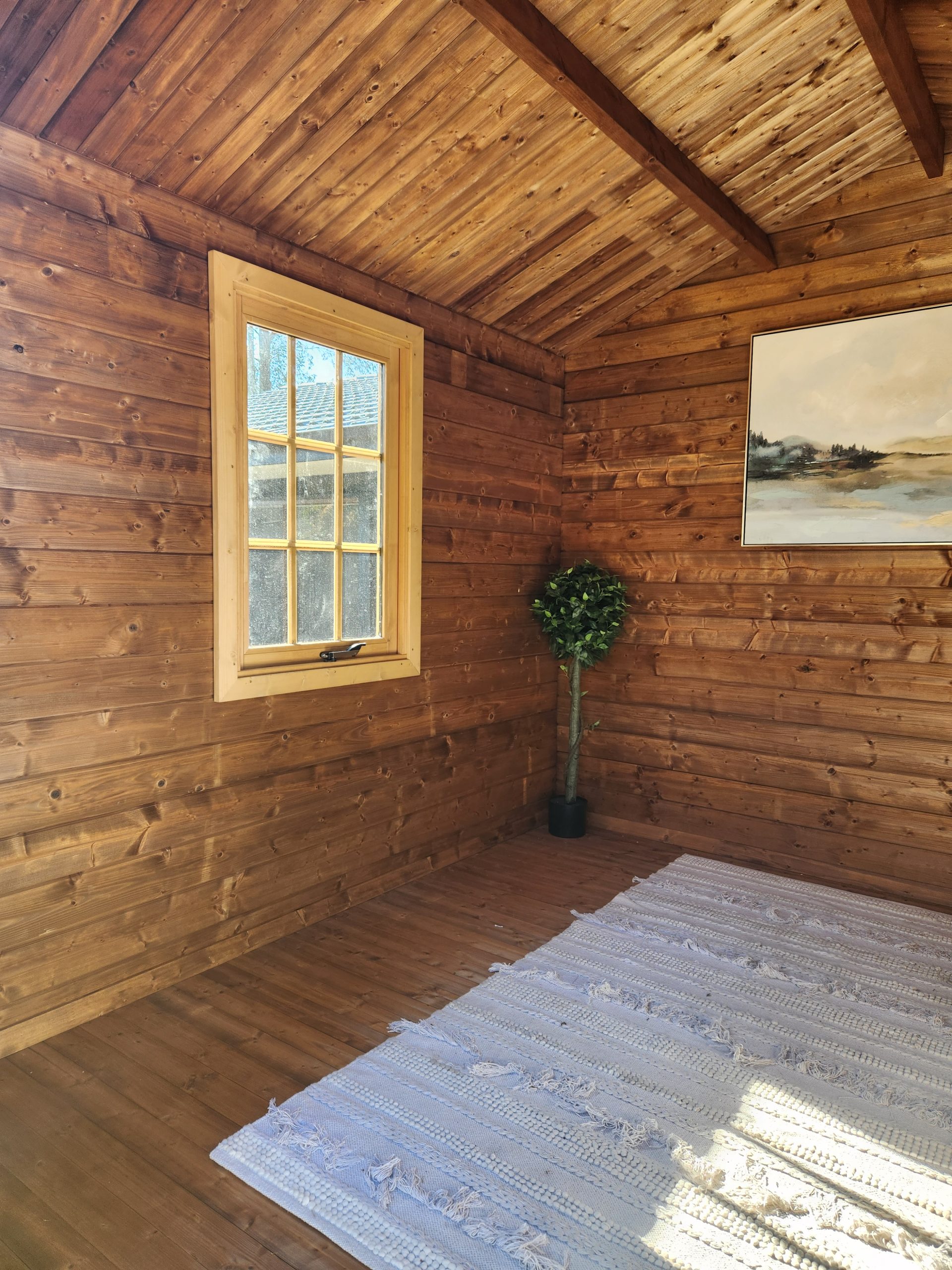 inside of unpainted star cabin display home office with casement window