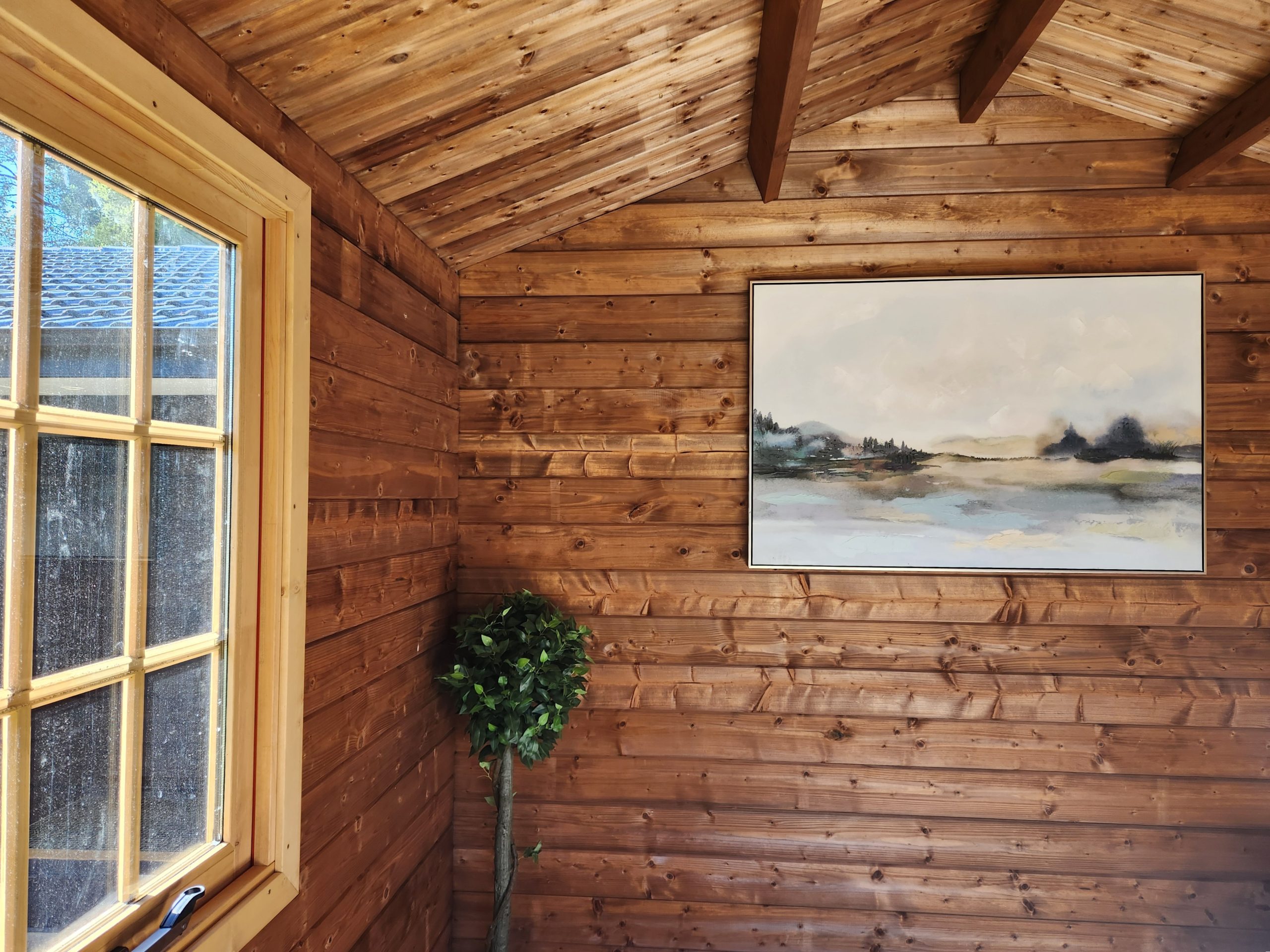 inside of unpainted star cabin display home office with casement window