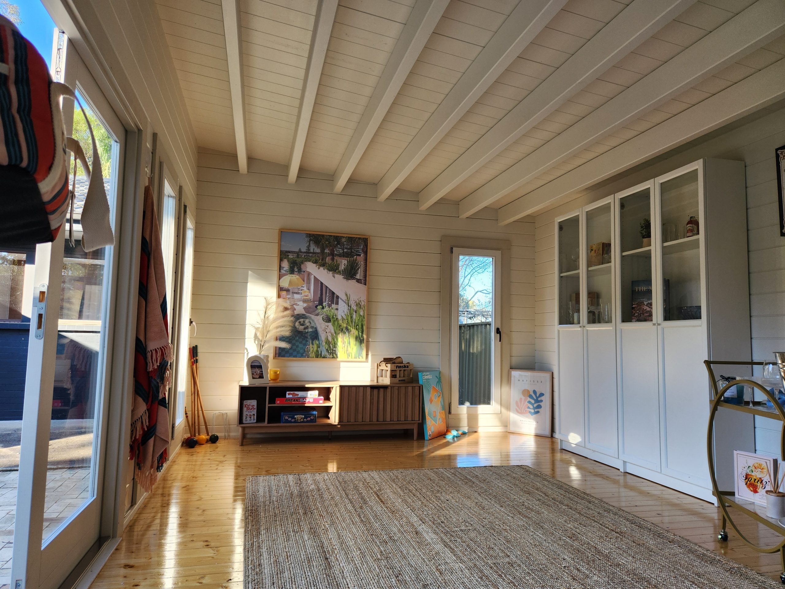 inside of painted poolhouse themed alpine display cabin