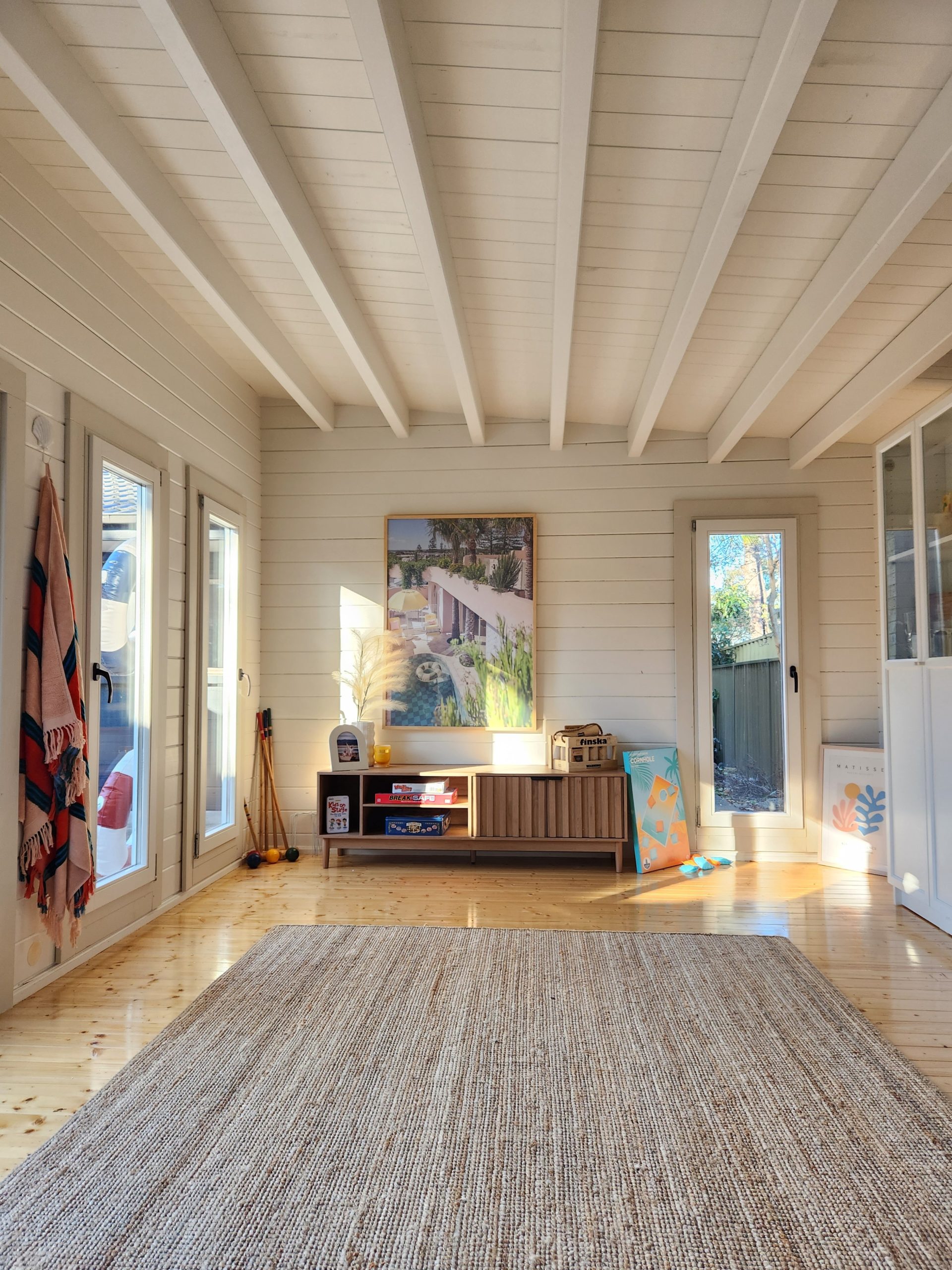 inside of painted pool house themed alpine display cabin