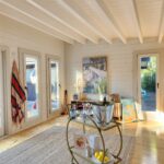 inside of painted poolhouse themed alpine display cabin