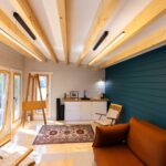 inside of alpine cabin art studio with tilt and turn windows