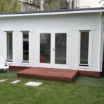 outside of home office alpine cabin with custom deck