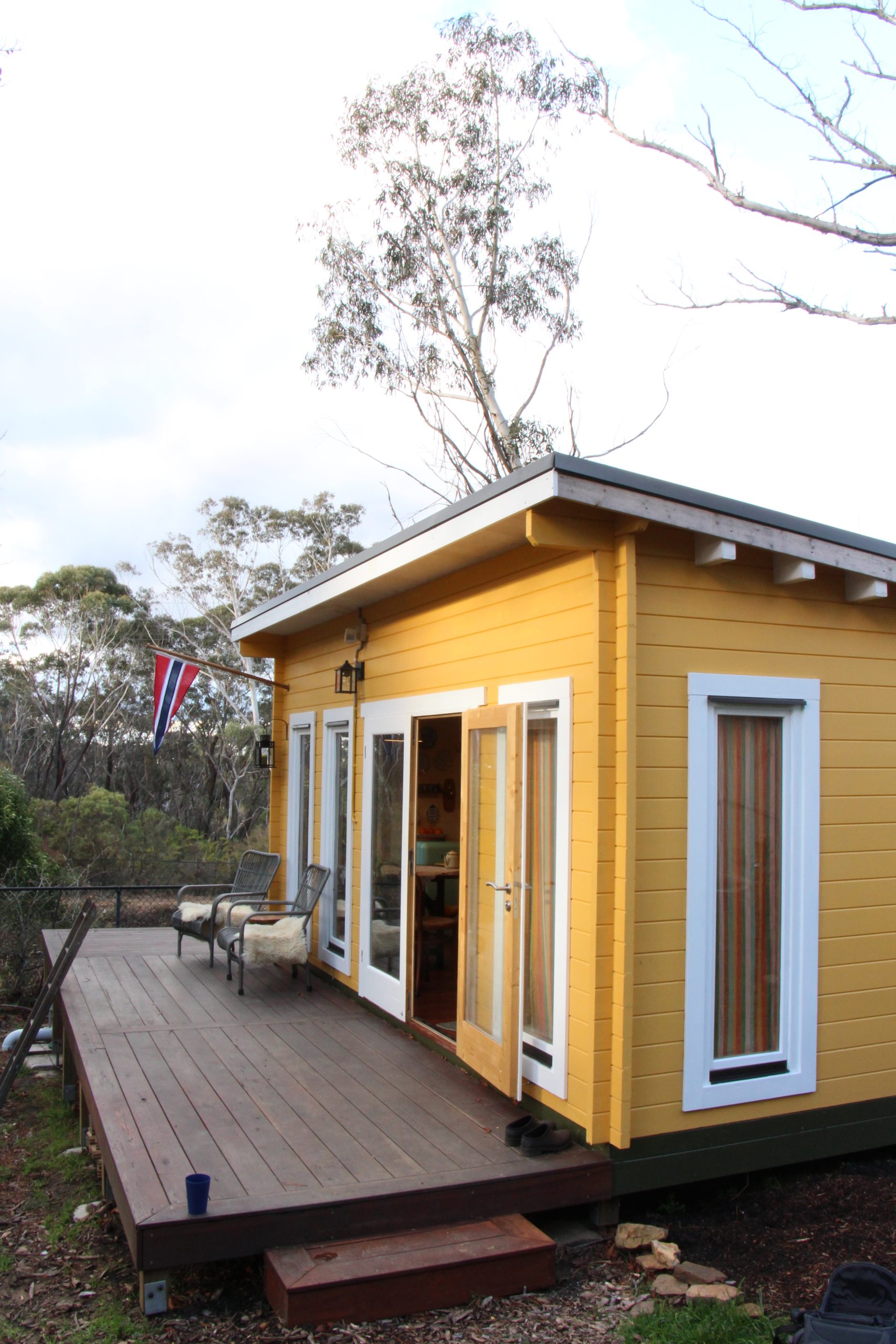 outside of alpine cabin sleepout with custom deck