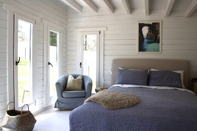 inside backyard retreat alpine cabin with tilt and turn windows