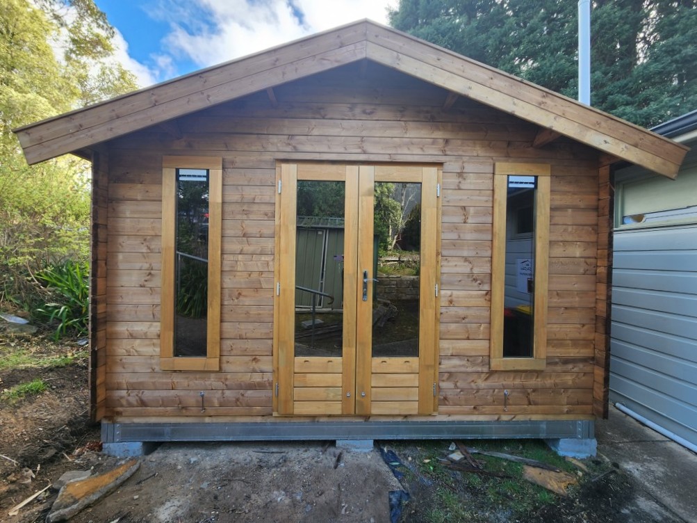 outside tasman display cabin with french doors closed