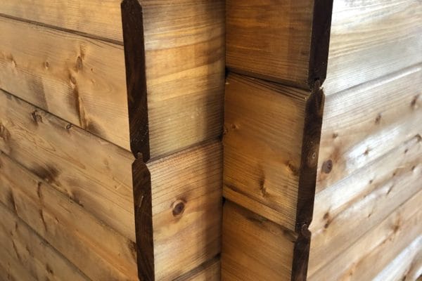 Close up of the pressure treated she shed corner details