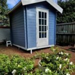 outside of painted cottage garden cabin storage shed