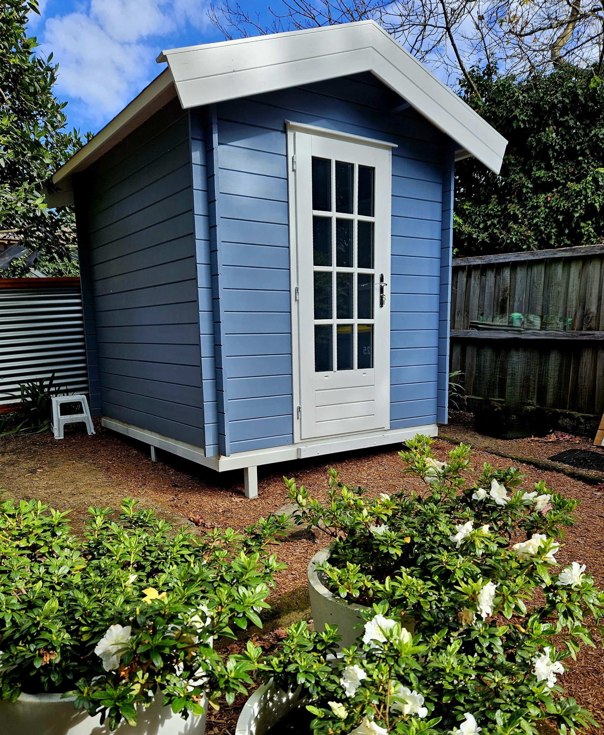 outside of painted cottage garden cabin storage shed