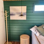 inside painted tasman display cabin with part fixed long window