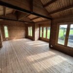 inside of a blank lake cabin as a home gym