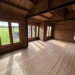 inside of a blank lake cabin as a home gym
