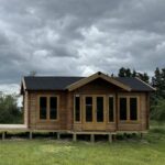 outside of lake cabin as a tiny home