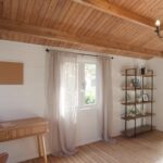 inside of tasman cabin country farm style with open barn door