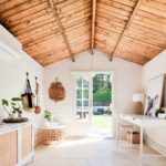 inside of painted cabana cabin backyard retreat with french doors