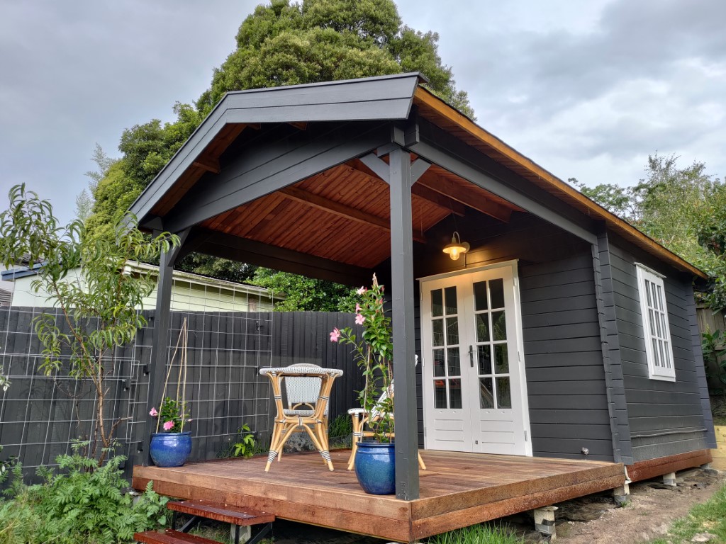 outside of painted star canopy cabin backyard retreat