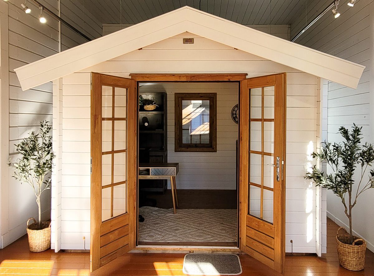 example of a home office set up in a kitset cabin at She Sheds Nelson display