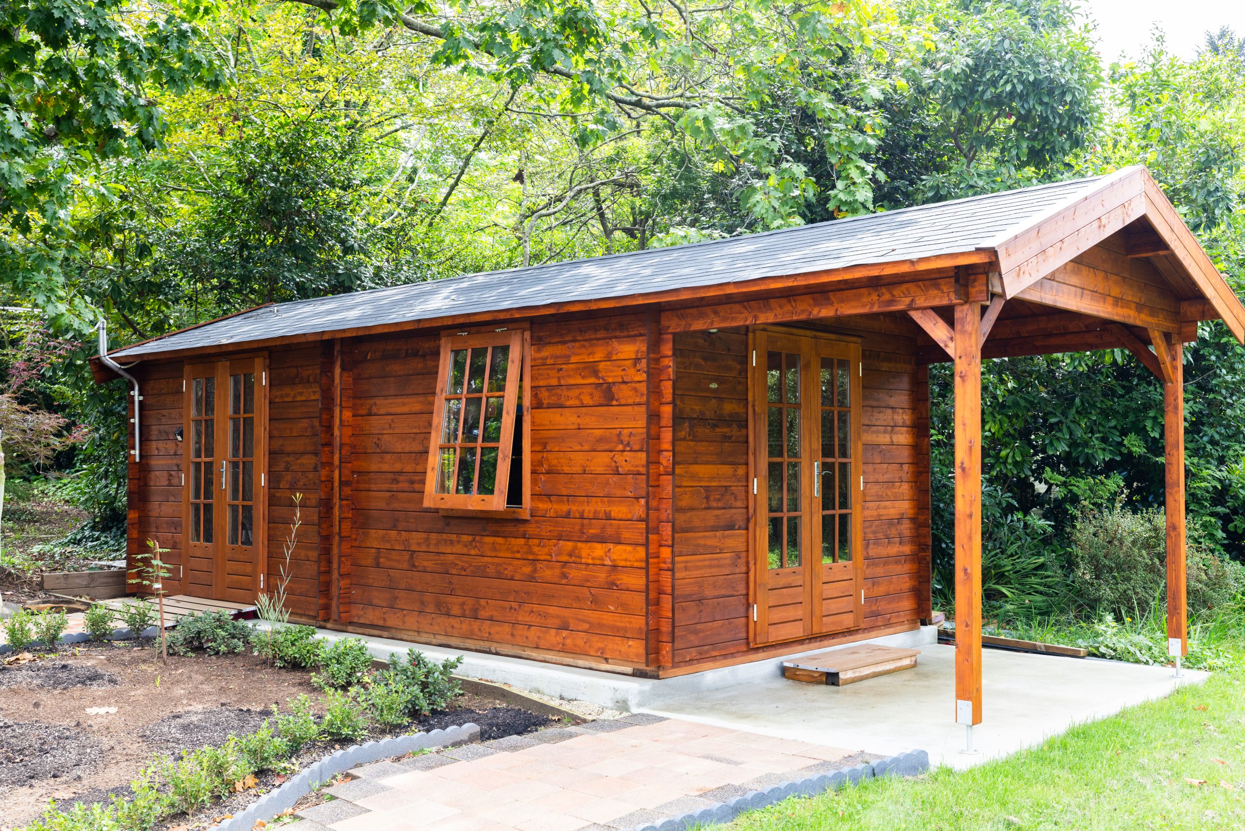 inside of star deluxe canopy cabin shed with top hung windows and french doors