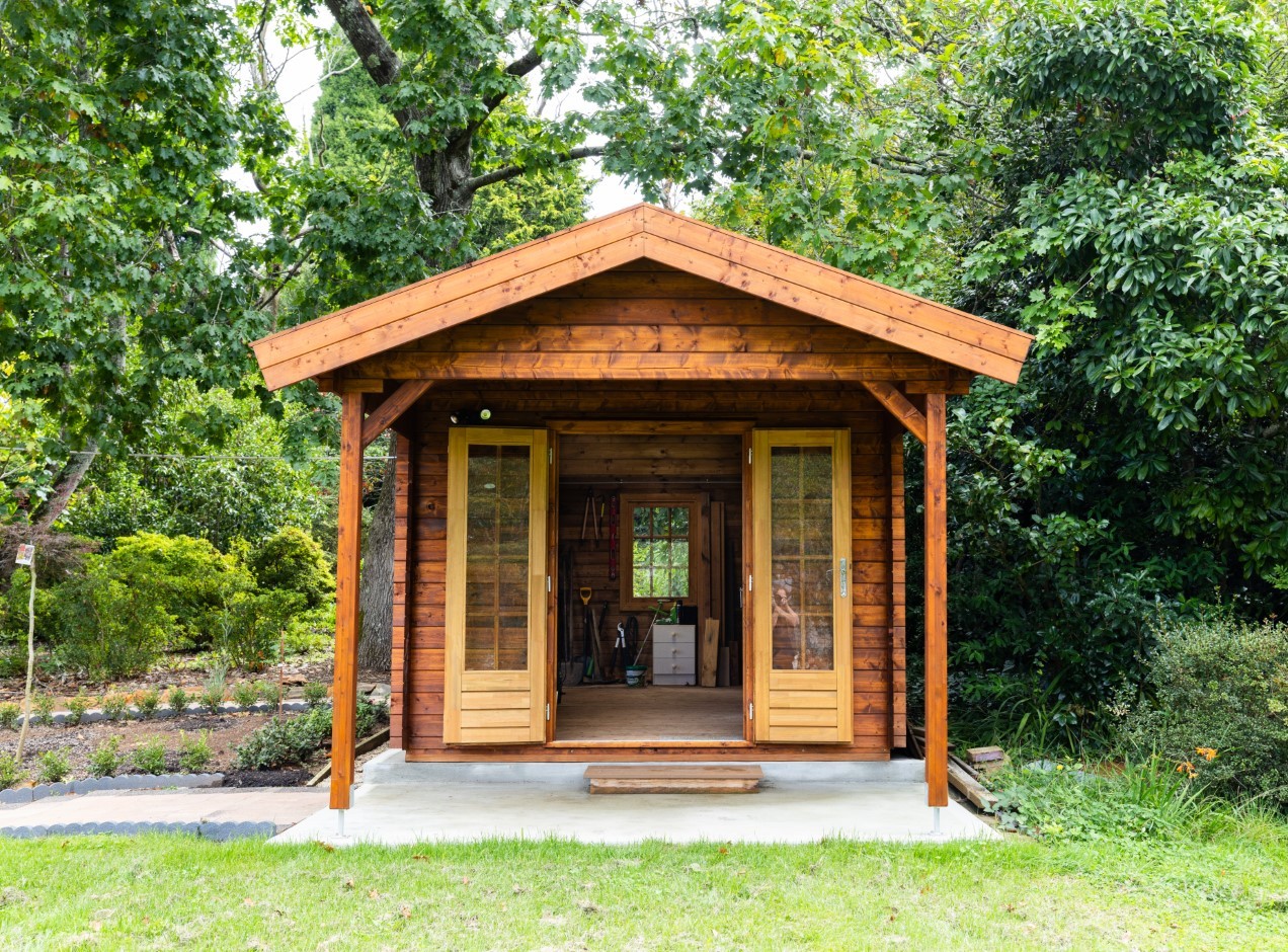 outside of star deluxe canopy cabin used as shed