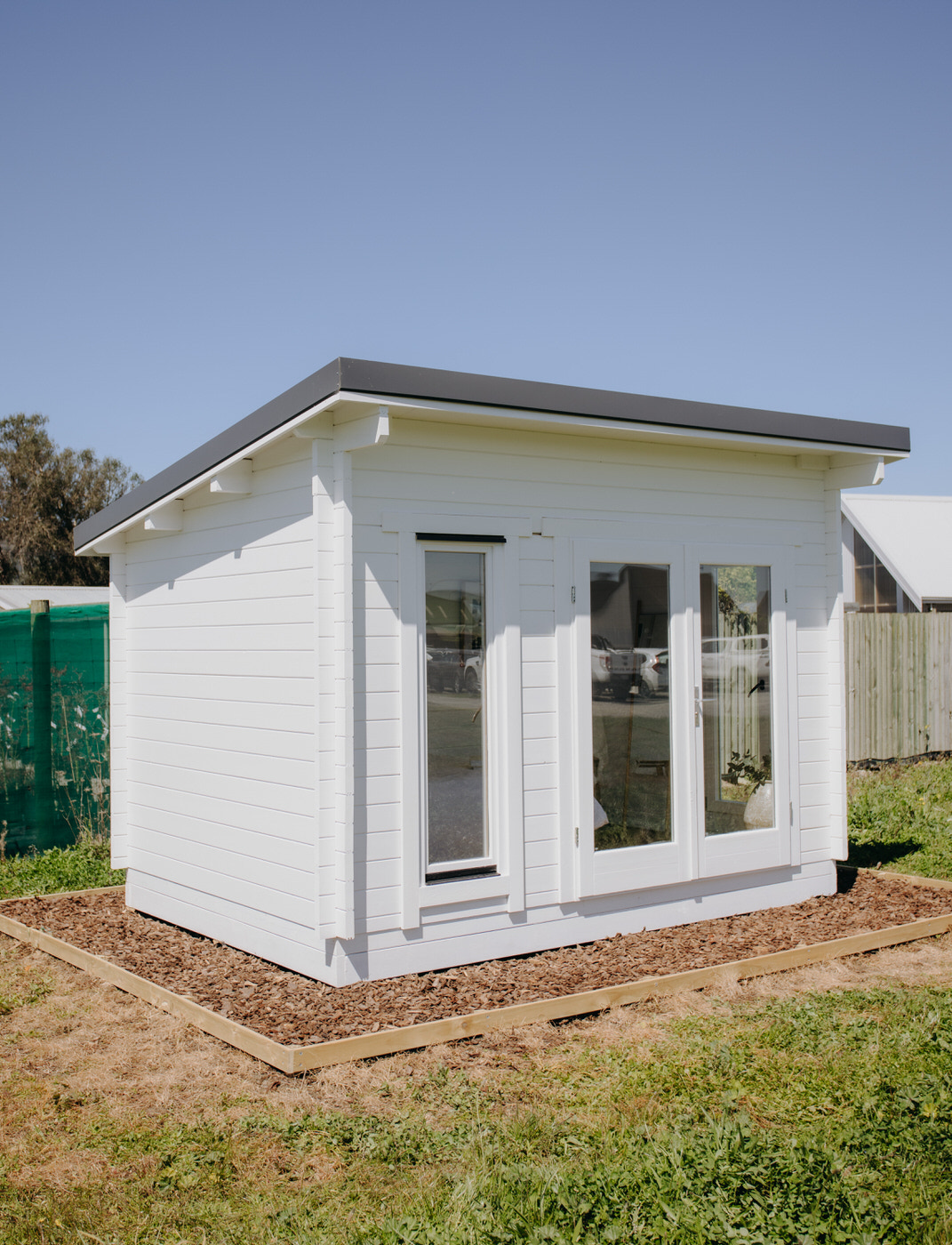 outside of painted tussock display cabin home office