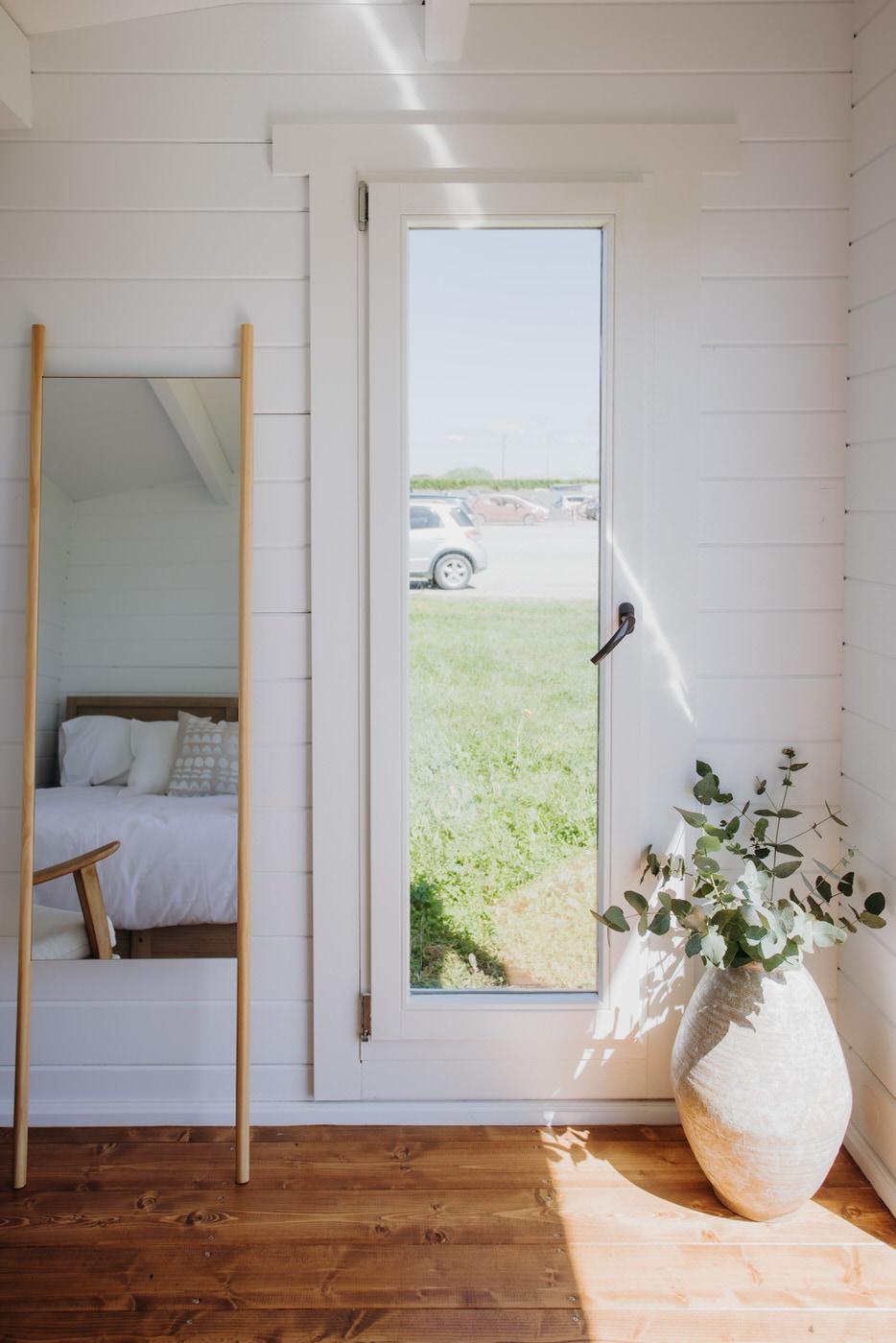 inside painted tussock display cabin home office with tilt and turn window