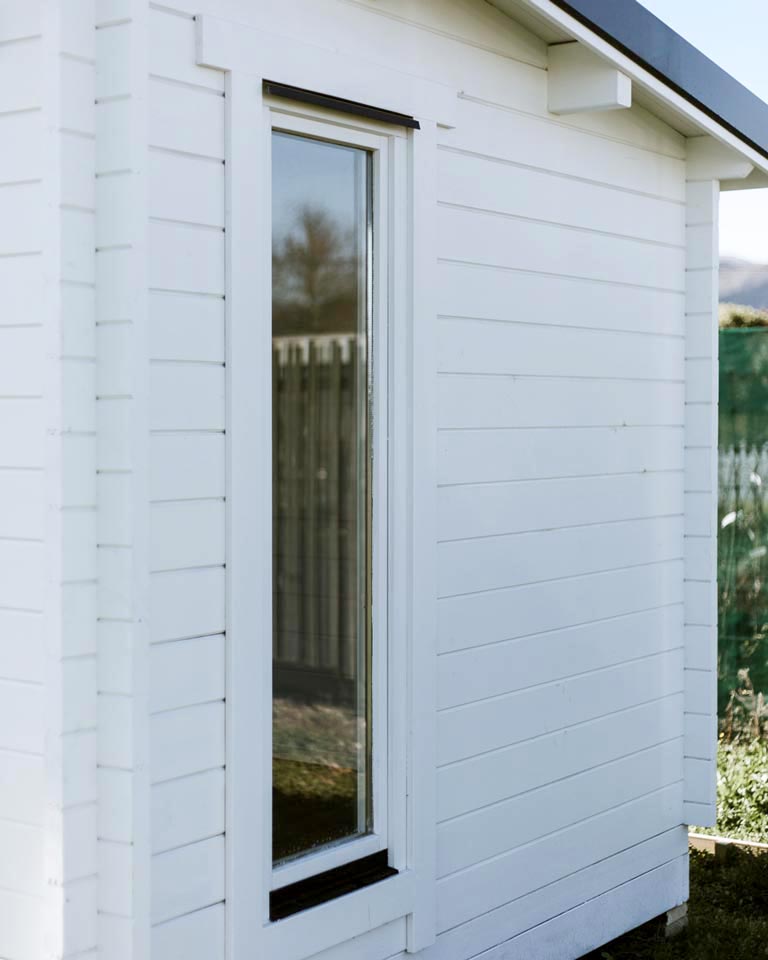 outside of tussock display cabin with fixed vented window closeup