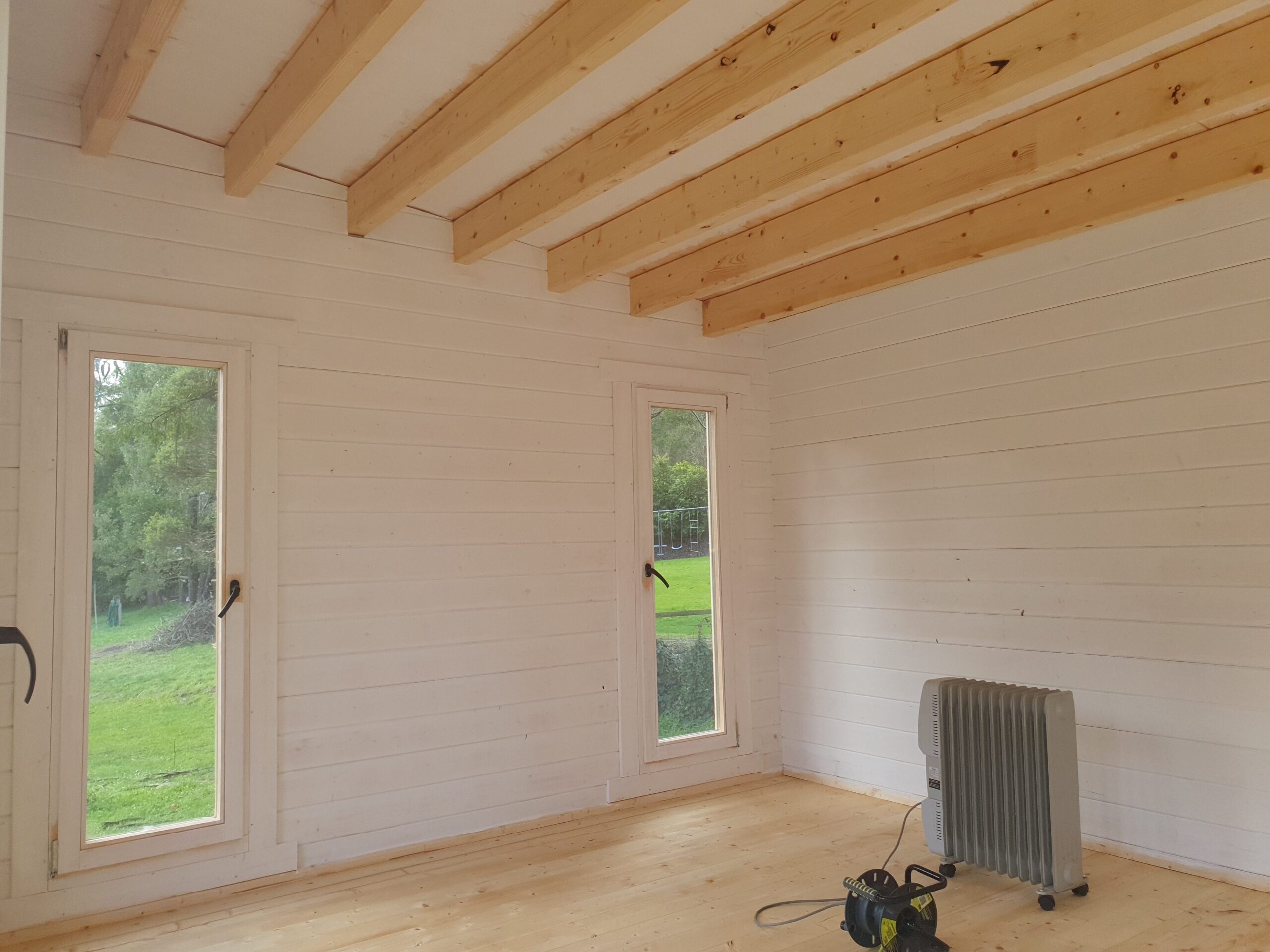 Alpine Cabin interior being painted