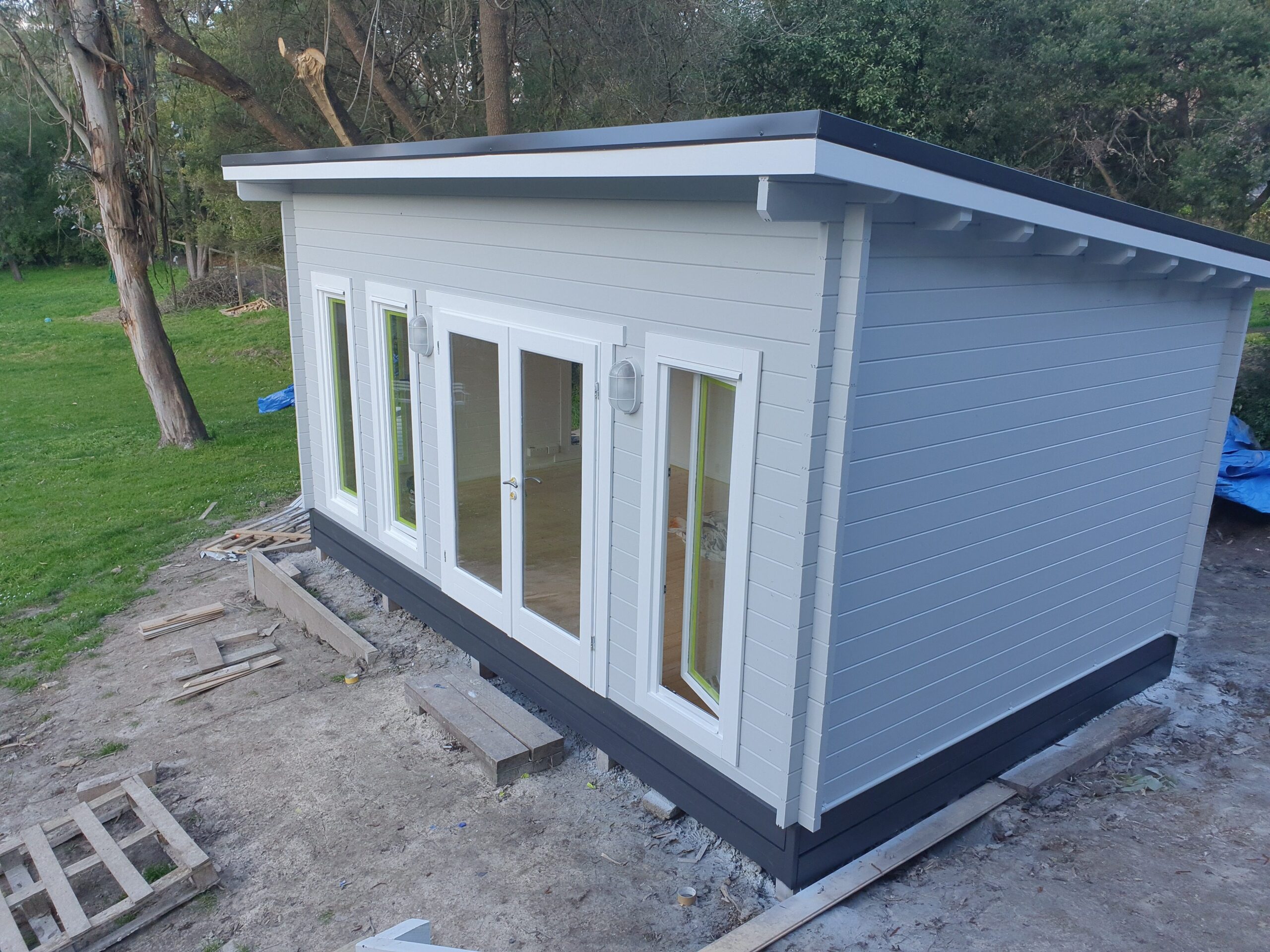 Alpine cabin painted to match the house