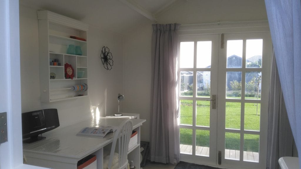 sewing room in a cabin with curtains in NZ
