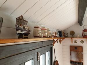 Crafts on display in a timber cabin