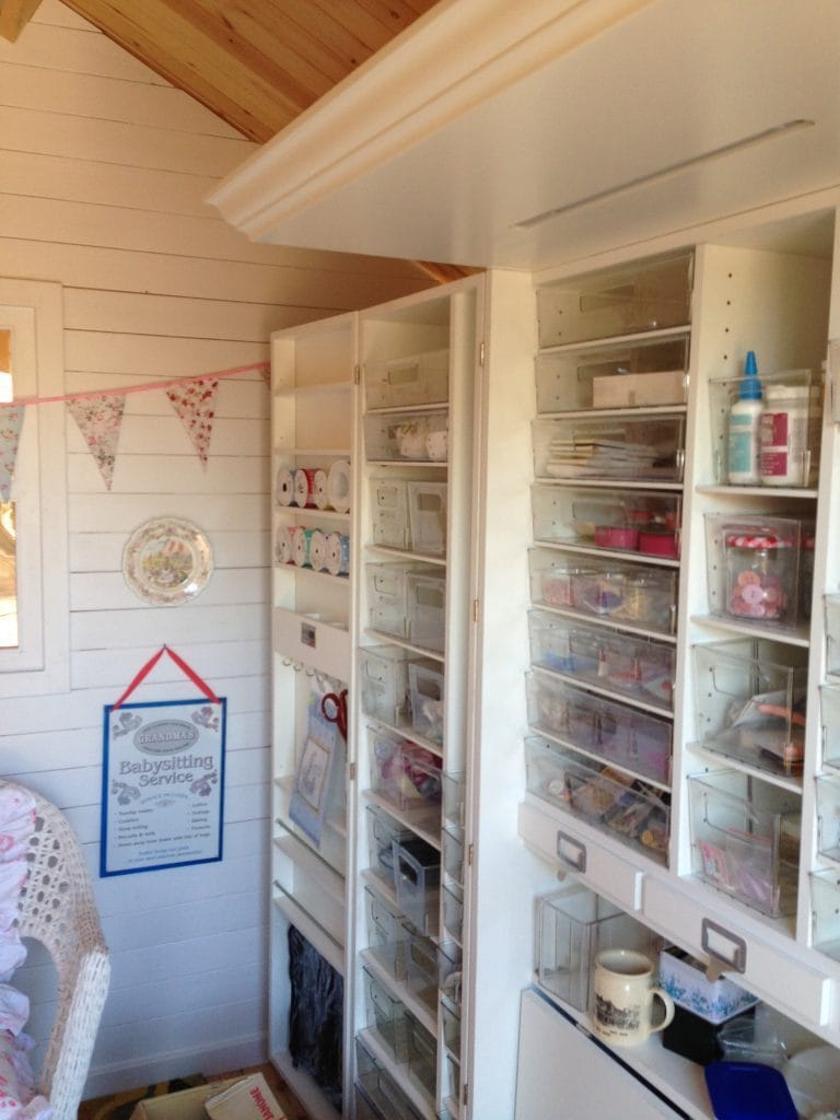 Scrapbooking supplies in a she shed studio